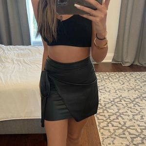 Pleather black cross over/ tie detail mini skirt